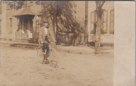 RPPC Man Riding Bicycle on Dirt Road Real Photo Postcard Y17 - £9.36 GBP
