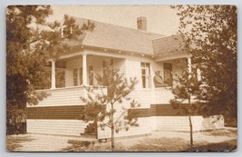 RPPC Man Sitting At House Unique Porch Skirting Armstrong Photo Postcard... - £7.46 GBP