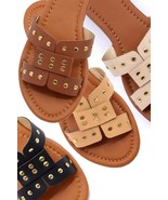 Slide sandal with rivet studs - €26,23 EUR