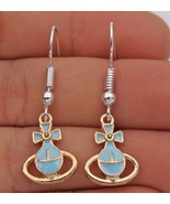 Bow-Knot Blue Saturn Earrings - $56.26 MXN