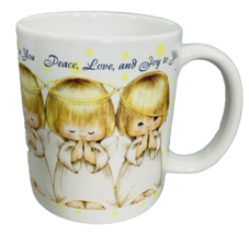 Hallmark Coffee Mug Peace Love and Joy to You Three Praying Angels Crooked Halo - £14.86 GBP