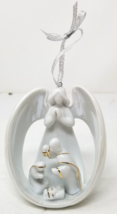 Angel Watching Birth of Jesus Christmas Ornament 1990 Ceramic White Vintage - $14.20