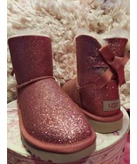 UGG Mini BAILEY BOW SPARKLE GLITTER BOOT Ankle Booties Shearing Lamb Fur... - $3,727.80 MXN