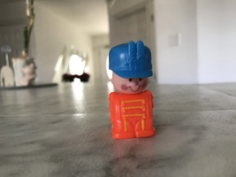 Vintage 1974 GMFG INC. orange soldier toy in blue hat (Honk Kong) - $8.50