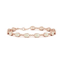 Authenticity Guarantee

ANGARA Oval Opal Infinity Link Bracelet with Milgrain... - £1,109.62 GBP