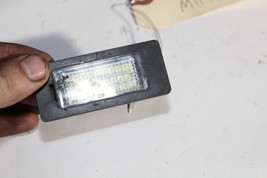 2007-10  E92 BMW 328i COUPE REAR TRUNK LID LICENSE PLATE LIGHT ILLUMINATOR M1198 image 4