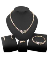HUGS &amp;KISSES xo set necklace bracelet earrings ring multi colored gold f... - $551.36 MXN