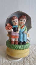 Vintage Rotating Ceramic Music Box Boy and Girl under Umbrella 7 1/2&quot; Fi... - $243.83 MXN