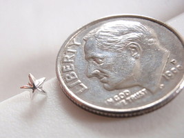 Tiny Star 925 Sterling Silver Straight Nose Stud - £2.83 GBP