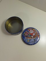 small 4 1/2 inch metal decorative tin with Santa and sleight 2001 - $4.95