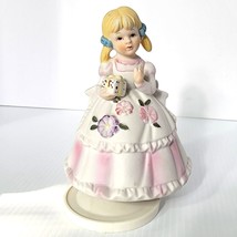 Rotating Music Box Little Girl Holding Gift Fine Porcelain Vintage Flambro - $12.61