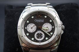 Mens CARAVELLE Bulova Sport Watch 43C29 Silver Tone Band Black Face Keep... - $70.00