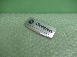 WB02X26123  GE Monogram Refrigerator Badge Logo Name  ~ 3-3/4&quot; x 1-3/4&quot; - $700.76 MXN