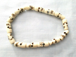 Carved Skull Beads Antique Color Bison Bone Bead Stretch Bracelet 8 Inch - £7.89 GBP