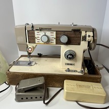 Vtg Dressmaker Sewing Machine Model #1692 Woodgrain With Case Pedal Attachments - £94.82 GBP