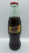 1999 Coca-Cola 8 oz Commemorative Glass Bottle  World of Coke ATLANTA - $14.84