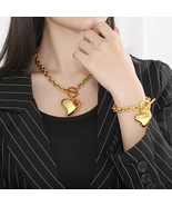 2023 new arrivals HEART CHARM fashion fastnees gold and silver necklase  and bra - $55.00