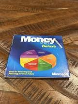 Microsoft Money 2001 Deluxe CD ROM For Win 95/98/2000/XP Cardboard Sleeve - £7.88 GBP