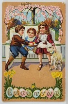Easter Children on Bench with Eggs and Lamb Embossed 1913 Postcard S9 - $4.95