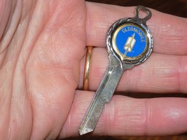 Vintage Oldsmobile Metal Car Key - $442.88 MXN
