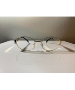 Unisex, gold framed sunglasses with oval shaped clear lenses - $10.00