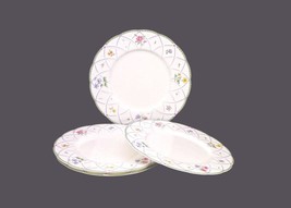 Four Mikasa Spring Prose A8010 dinner plates. Flaw (see below) - $82.12