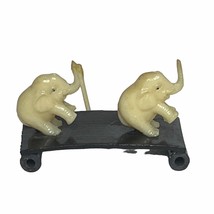 Vintage Celluloid Elephant Figurine 2 Elephants on Black Base Trunks Up - $278.12 MXN