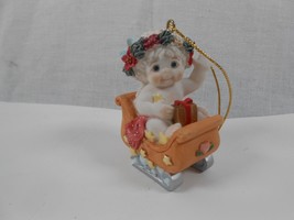 Vintage Dreamsicles Cherub in Sled Christmas Ornament - $7.70