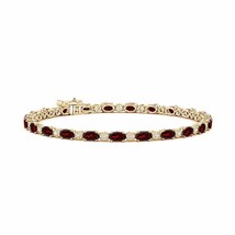 ANGARA Oval Garnet Tennis Bracelet with Gypsy Diamonds in 14K Solid Gold - £2,273.18 GBP