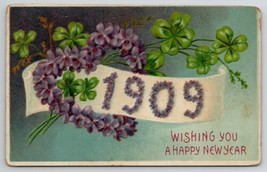 New Year Greeting 1909 Purple Flowers Banner Clover Emb Postcard Q25 - £3.10 GBP