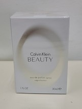 Beauty by Calvin Klein Eau De Parfum Spray 1 oz Women - £14.48 GBP