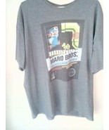 NINTENDO! THE OFFICIAL MARIO BROS TSHIRT AND YOSHI STUFFED TOY.  - $14.92 CAD