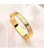 Stainless steel- Gold wide bangle - $427.80 MXN