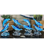 Pack Of 4 Marine Sea Blue Dolphins Swimming By Waves And Coral Reef Figu... - $30.07 CAD