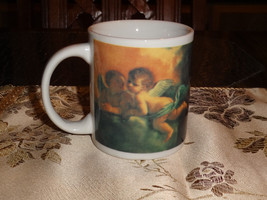 MUGS - 2 - w/ANGELS all around, different prints on ea  - $5.94