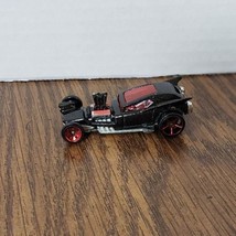 Hot Wheels Fangula from 2010 New Models Black Metal Flake and Red Variant - £1.54 GBP