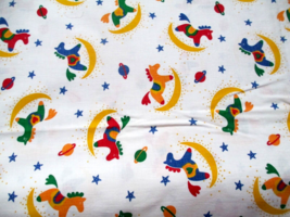 Fabric Concord Rocking Horses of Red Green Blue on White Background 44&quot; x 40&quot; $3 - $3.00