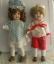 Vintage Signed Bisque/Porcelain Googly Eye Dolls Girl &amp; Boy Painted Legs, Shoes - £428.31 GBP