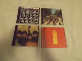 Four Beatles CDs – Abbey Road/Beatles 1/Beatles For Sale/A Hard Days Night–Lot D - £32.07 GBP