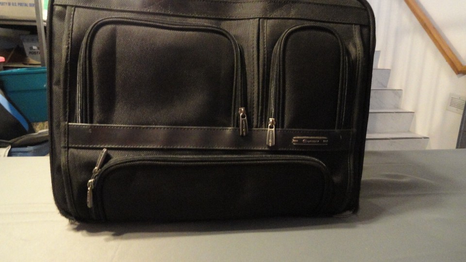 DELSEY PARIS ROLLING TRAVEL EXPANDABLE LUGGAGE W/ WHEELS UNDER SEAT CARR... - $80.55