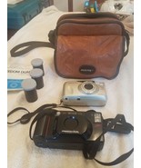2 cameras leather bag 3 rolls of film used freedom dual camera and kyocera - $135.82 CAD