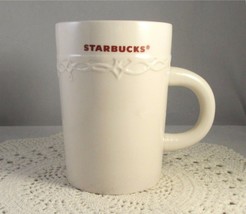 Starbucks Coffee Mug Cup 10 oz Embossed Cream With Red Lettering 2010 - £7.94 GBP