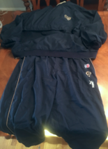 Rams Puma brand reversable sweatsuit. Blue and Tan in color. (Size XL). - $25.00
