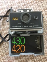 * Polaroid 420 Automatic Land Camera, Focus flash and flash bulbs - $32.73