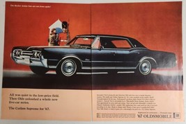 1966 Print Ad The 1967 Oldsmobile Cutlass Supreme 4-Door 320-HP Rocket Olds - £16.53 GBP
