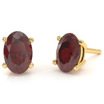 Lab-Created Ruby 8x6mm Oval Stud Earrings in 14k Yellow Gold - £275.73 GBP