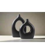 The Embrace vase - $6,523.98 MXN
