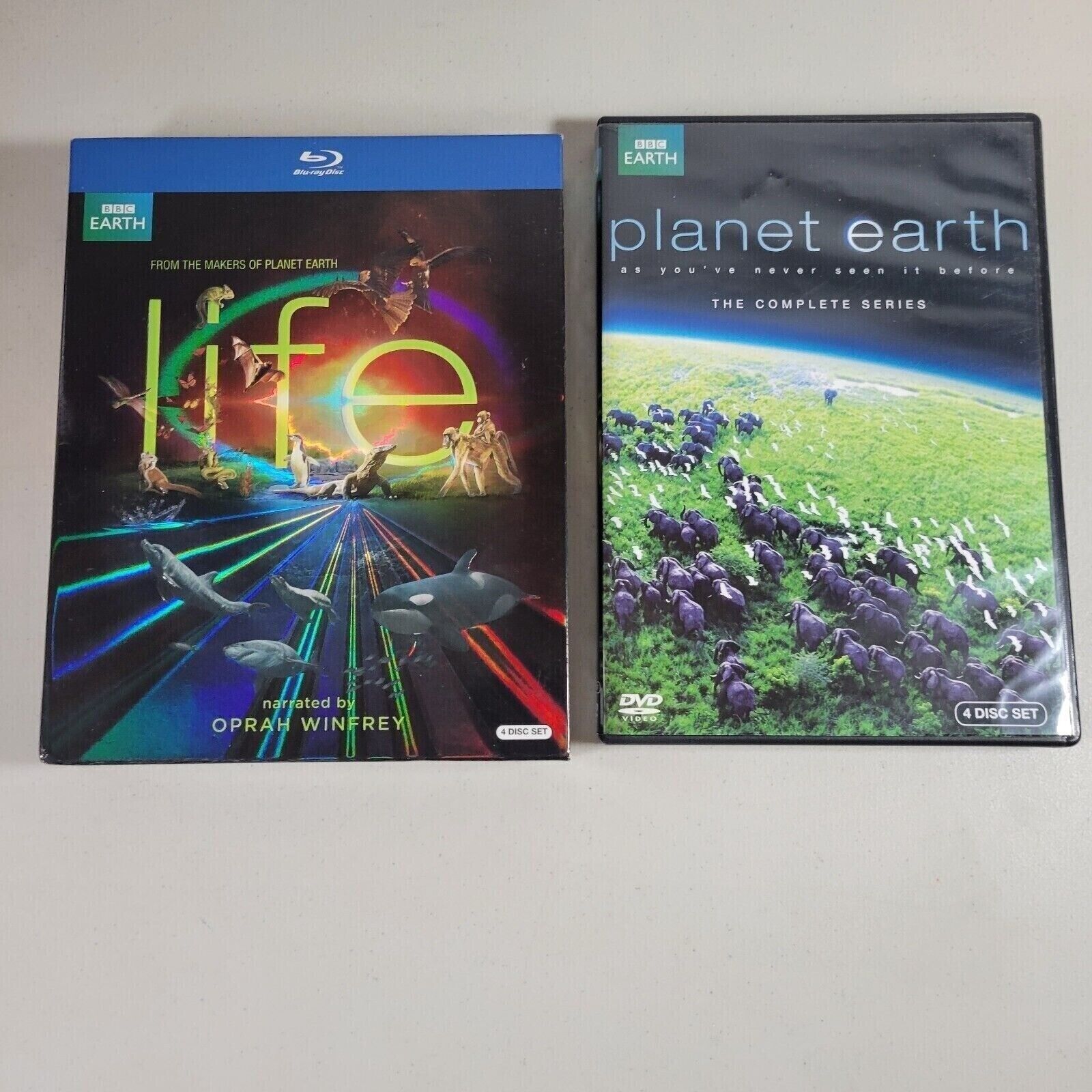 Primary image for BBC Earth Life Blu Ray 4 Disc Set Narrated by Oprah Winfrey and Planet Earth DVD