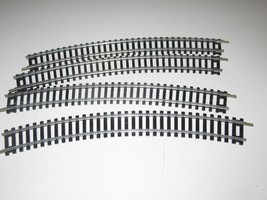 HO - FOUR SECTIONS OF 18&quot; CURVE STEEL TRACK - EXC. - H21 - $26.69 MXN