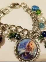 Mermaid / Siren Charm Bracelet With Dolphin Clasp and real coral - $24.75